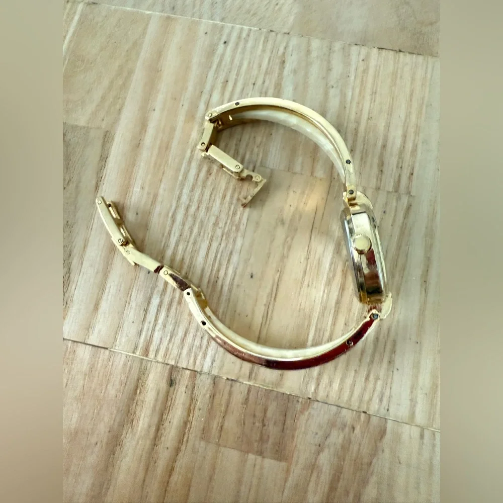 Rumours ladies gold tone watch NEW BATTERY